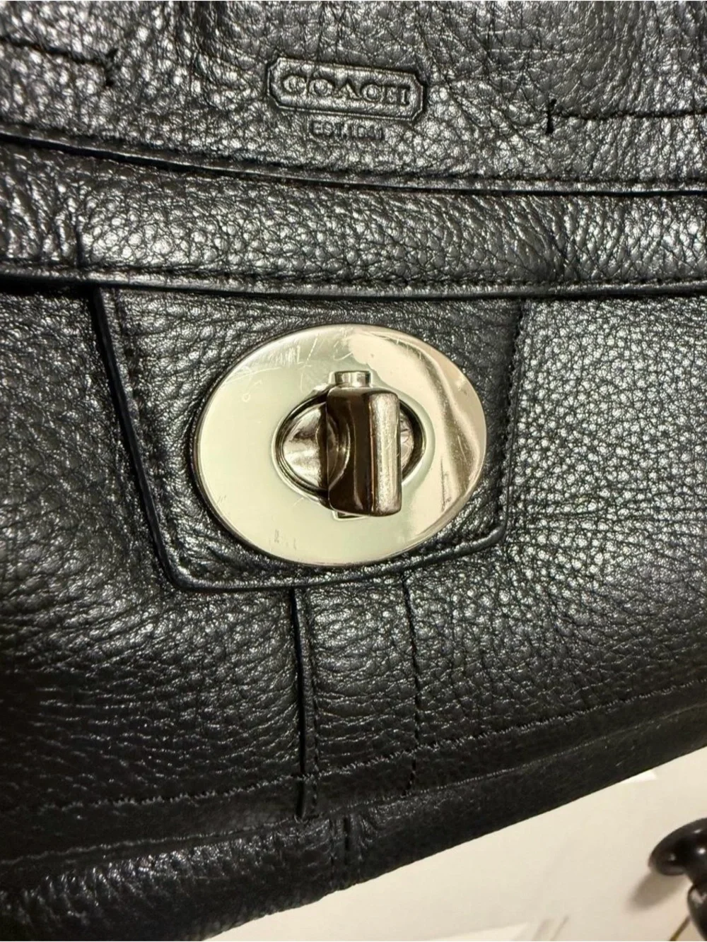 Coach 2010 shoulder